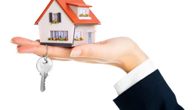 House-in-realtor-hand-1-1080x720