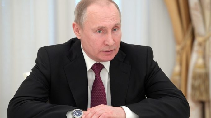 Путин
