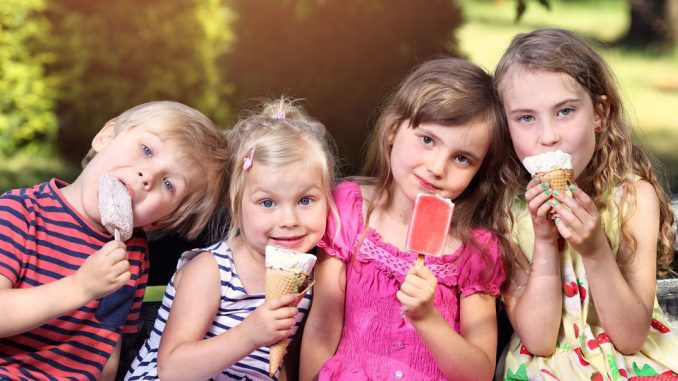 40758685 - adorable children eating ice cream on holiday