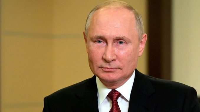 Путин