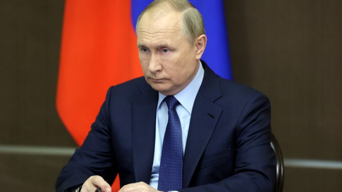 Путин